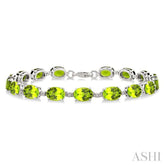 7X5 MM Oval Shape Peridot and 1/10 Ctw Round Cut Diamond Semi-Precious Bracelet in Sterling Silver