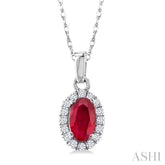 5x3 MM Oval Shape Ruby and 1/20 Ctw Round Cut Diamond Halo Precious Pendant with Chain in 14K White Gold