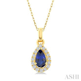 5x3 MM Pear Shape Sapphire and 1/20 Ctw Round Cut Diamond Halo Precious Pendant with Chain in 10K Yellow Gold