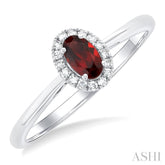 5x3 MM Oval Shape Garnet and 1/20 Ctw Round Cut Diamond Halo Semi-Precious Ring in 14K White Gold