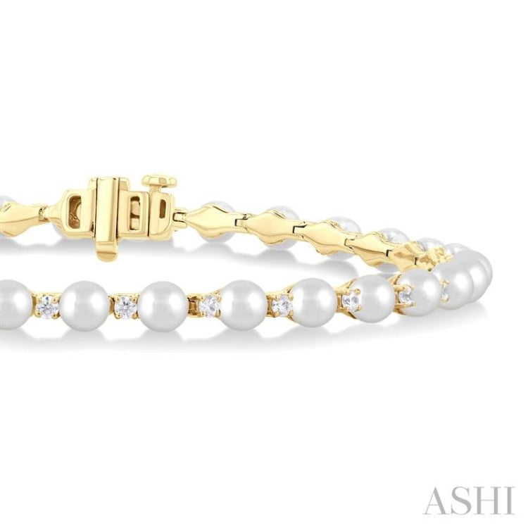 4 MM Cultured Pearl and 3/4 Ctw Round Cut Diamond Tennis Bracelet in 14K Yellow Gold