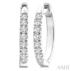 1/4 Ctw Round Cut Diamond Huggie Petite Earrings in 10K White Gold
