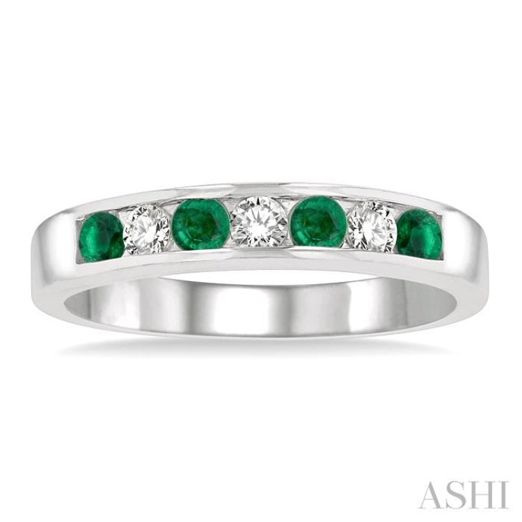 2.5 MM Round Cut Emerald and 1/5 Ctw Channel Set Round Cut Diamond Band in 14K White Gold
