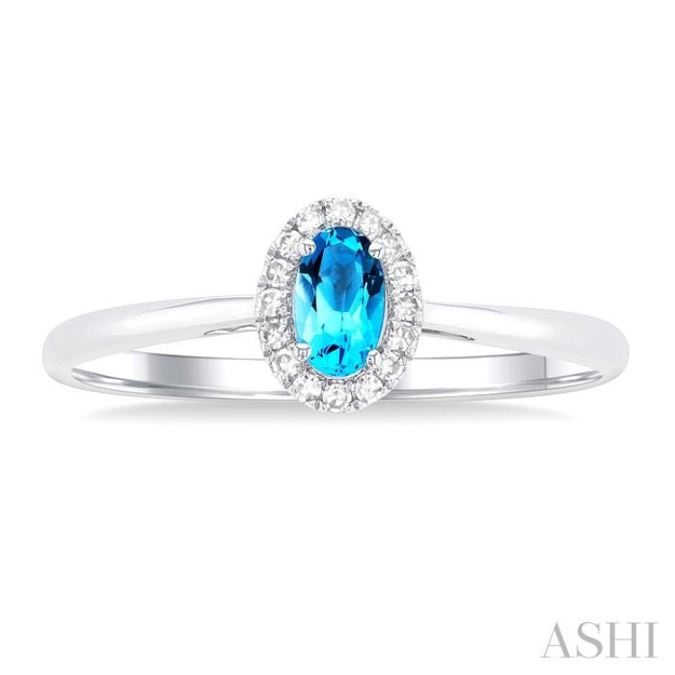 5x3 MM Oval Shape Blue Topaz and 1/20 Ctw Round Cut Diamond Halo Semi-Precious Ring in 14K White Gold