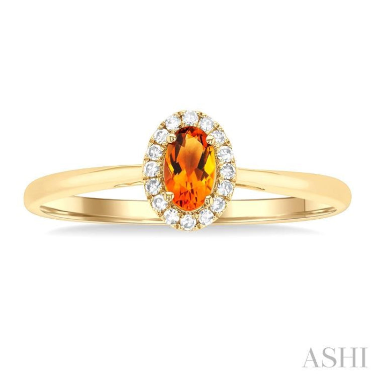 5x3 MM Oval Shape Citrine and 1/20 Ctw Round Cut Diamond Halo Semi-Precious Ring in 10K Yellow Gold
