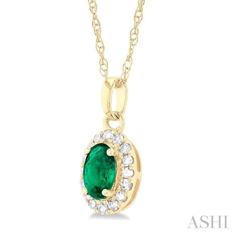 5x3 MM Oval Shape Emerald and 1/20 Ctw Round Cut Diamond Halo Precious Pendant with Chain in 10K Yellow Gold