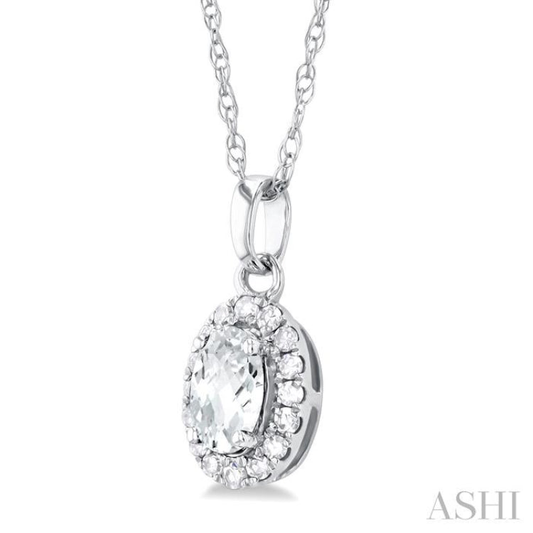5x3 MM Oval Shape White Topaz and 1/20 Ctw Round Cut Diamond Halo Semi-Precious Pendant with Chain in 14K White Gold