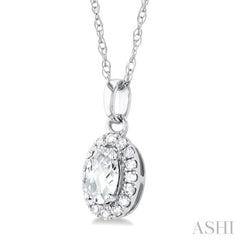 5x3 MM Oval Shape White Topaz and 1/20 Ctw Round Cut Diamond Halo Semi-Precious Pendant with Chain in 14K White Gold