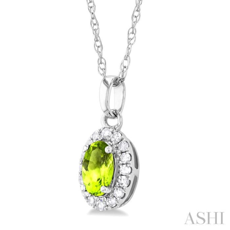 5x3 MM Oval Shape Peridot and 1/20 Ctw Round Cut Diamond Halo Semi-Precious Pendant with Chain in 10K White Gold