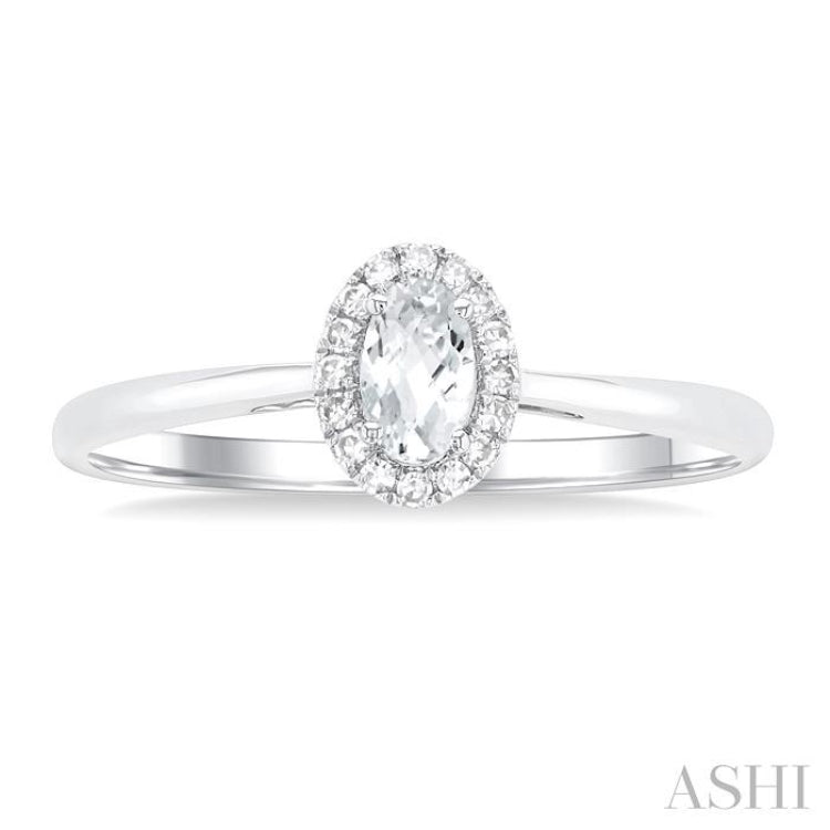 5x3 MM Oval Shape White Topaz and 1/20 Ctw Round Cut Diamond Halo Semi-Precious Ring in 14K White Gold