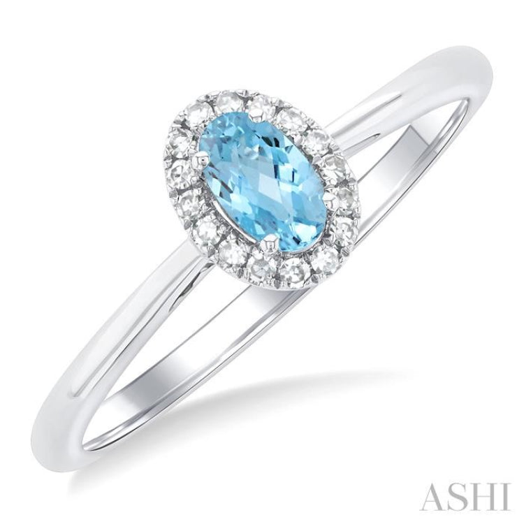 5x3 MM Oval Shape Aquamarine and 1/20 Ctw Round Cut Diamond Halo Semi-Precious Ring in 14K White Gold
