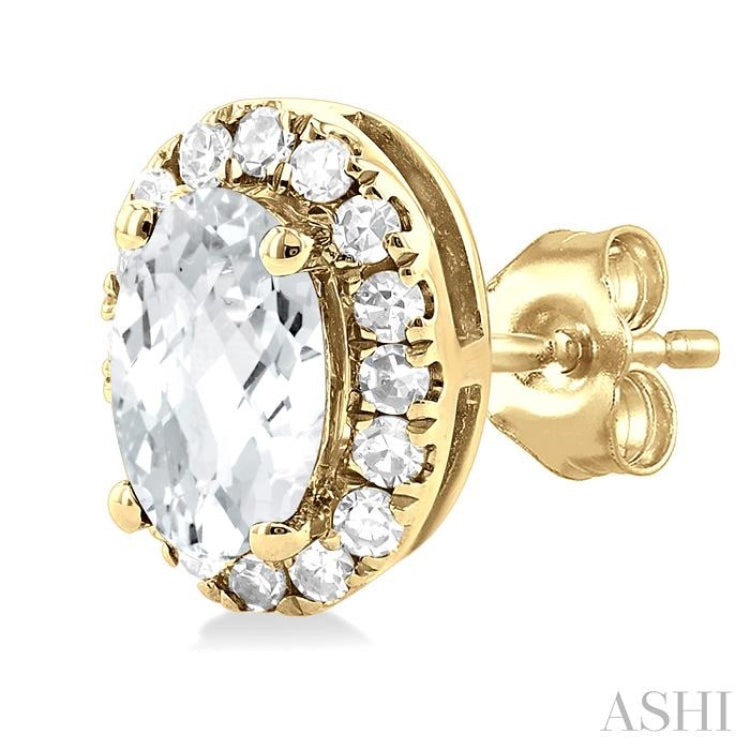 5x3 MM Oval Shape White Topaz and 1/8 Ctw Round Cut Diamond Halo Semi-Precious Stud Earrings in 10K Yellow Gold