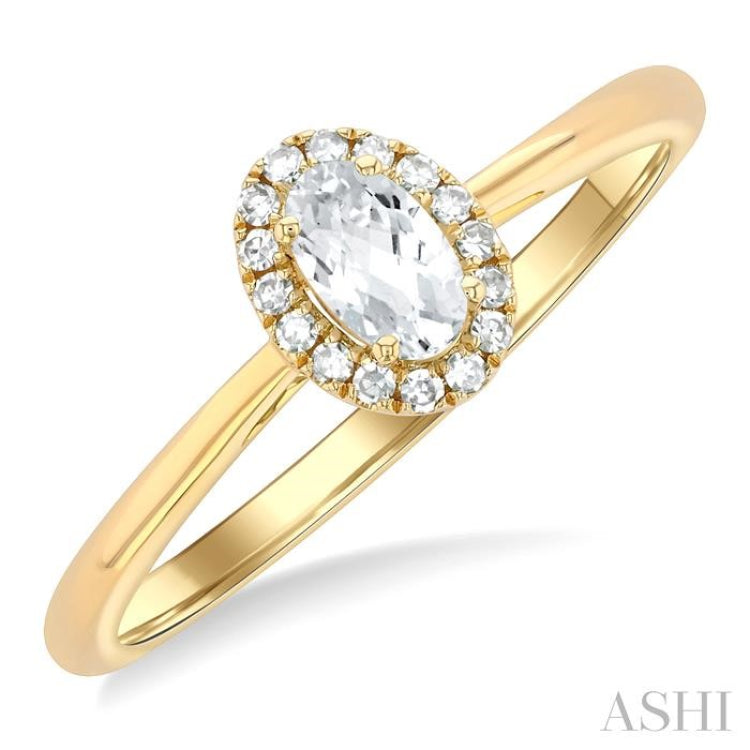 5x3 MM Oval Shape White Topaz and 1/20 Ctw Round Cut Diamond Halo Semi-Precious Ring in 10K Yellow Gold