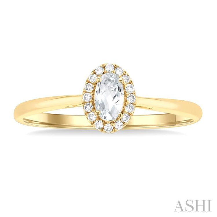 5x3 MM Oval Shape White Topaz and 1/20 Ctw Round Cut Diamond Halo Semi-Precious Ring in 10K Yellow Gold