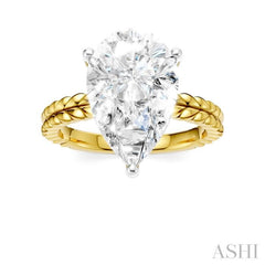 1/8 Ctw Pear Shape Round Cut Diamond Semi-Mount Engagement Ring in 14K Yellow and White Gold