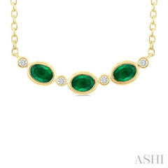4X3 MM Oval Cut Emerald and 1/50 Ctw Bezel Set Round Cut Diamond Precious Fashion Necklace in 10K Yellow Gold