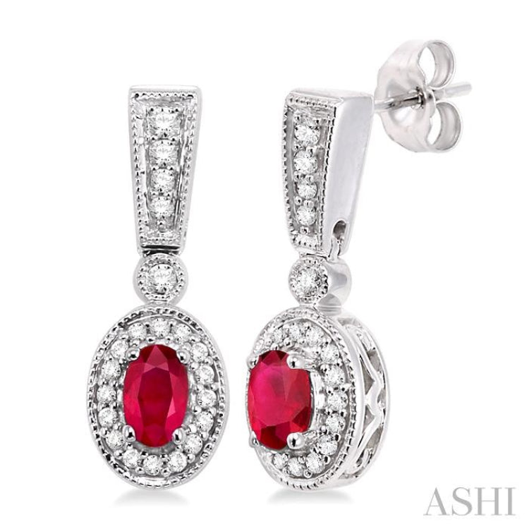 5x3 MM Oval Cut Ruby and 1/3 Ctw Round Cut Diamond Earrings in 14K White Gold