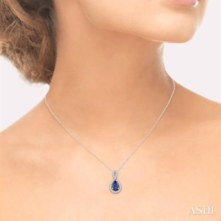 6x4 MM Pear Shape Sapphire and 1/10 Ctw Round Cut Diamond Pendant in 14K White Gold with Chain