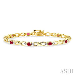 4x3 MM Oval Cut Ruby and 1/10 Ctw Single Cut Diamond Bracelet in 10K Yellow Gold