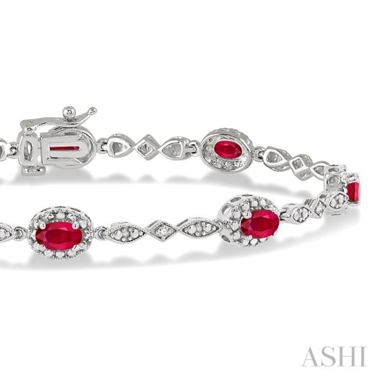 5x3 MM Oval Cut Ruby and 1/20 Ctw Single Cut Diamond Bracelet in 10K White Gold