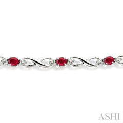 4x3 MM Oval Cut Ruby and 1/10 Ctw Single Cut Diamond Bracelet in 10K White Gold