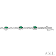 5x3 MM Oval Cut Emerald and 1/20 Ctw Single Cut Diamond Bracelet in 14K White Gold