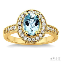 8x6mm Oval Cut Aquamarine and 1/3 Ctw Round Cut Diamond Ring in 14K Yellow Gold