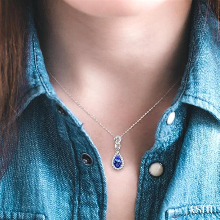 6x4 MM Pear Shape Tanzanite and 1/10 Ctw Round Cut Diamond Pendant in 14K White Gold with Chain