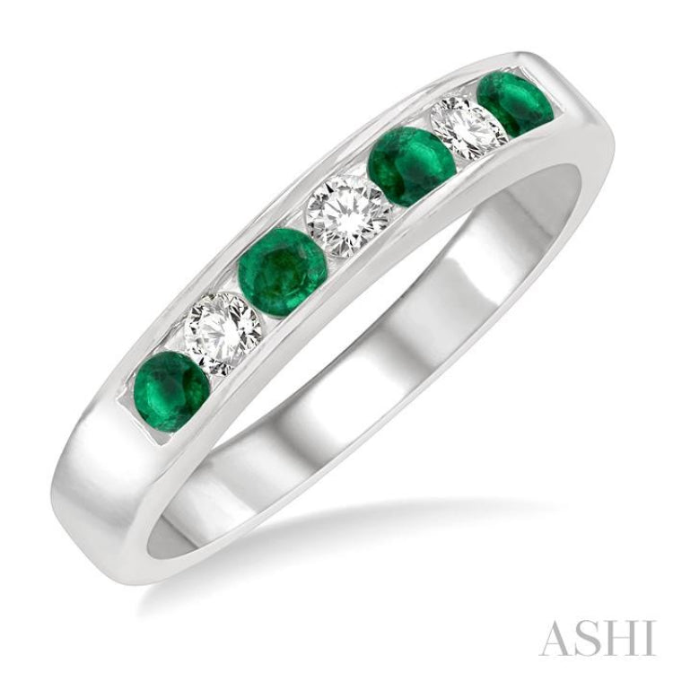 1/5 Ctw Channel Set Round Cut Diamond and 2.5 MM Round Cut Emerald Band in 14K White Gold