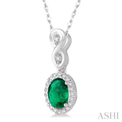 6x4 MM Oval Cut Emerald and 1/10 Ctw Round Cut Diamond Pendant in 10K White Gold with Chain