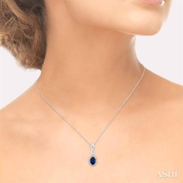 6x4 MM Oval Cut Sapphire and 1/10 Ctw Round Cut Diamond Pendant in 10K White Gold with Chain