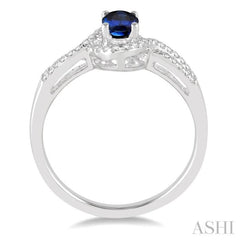 6x4 MM Oval Cut Sapphire and 1/6 Ctw Round Cut Diamond Ring in 10K White Gold