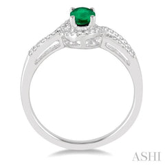 6x4 MM Oval Cut Emerald and 1/6 Ctw Round Cut Diamond Ring in 10K White Gold