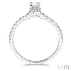 1/2 Ctw Round Cut Diamond Engagement Ring With 1/4 ct Oval Cut Center Stone in 14K White Gold