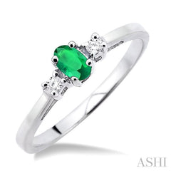 5x3 MM Oval Cut Emerald and 1/20 Ctw Round Cut Diamond Ring in 10K White Gold