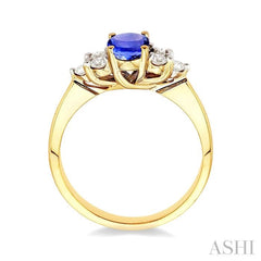 7x5mm Oval Cut Tanzanite and 1/3 Ctw Round Cut Diamond Ring in 14K Yellow Gold