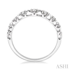 1/20 Ctw Round Cut Diamond Wedding Band in 14K White Gold