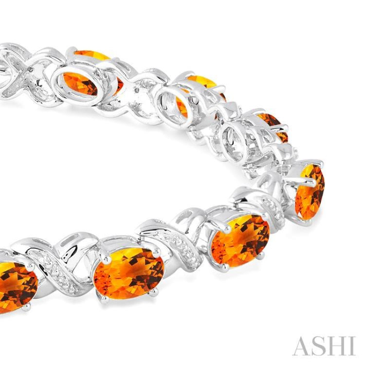 7x5  MM Oval Cut Citrine and 1/20 Ctw Round Cut Diamond Fashion Bracelet in Sterling Silver