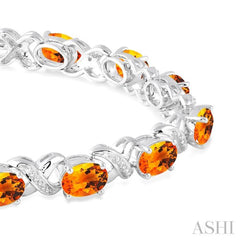 7x5  MM Oval Cut Citrine and 1/20 Ctw Round Cut Diamond Fashion Bracelet in Sterling Silver