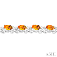 7x5  MM Oval Cut Citrine and 1/20 Ctw Round Cut Diamond Fashion Bracelet in Sterling Silver