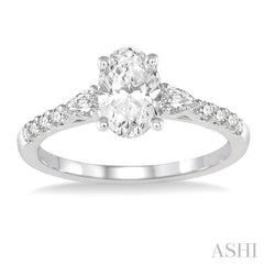 7/8 ctw Pear & Round Cut Diamond Engagement Ring With 1/2 ct Oval Cut Center Stone in 14K White Gold