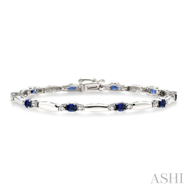 1/10 Ctw Bar and Oval Mount Round Cut Diamond & 5x3 MM Oval Cut Sapphire Precious Bracelet in 10K White Gold