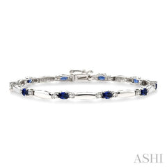 1/10 Ctw Bar and Oval Mount Round Cut Diamond & 5x3 MM Oval Cut Sapphire Precious Bracelet in 10K White Gold