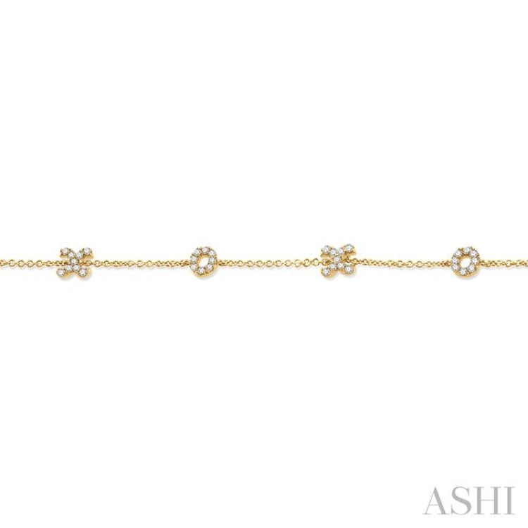 1/5 Ctw 'XO' Round Cut Diamond Station Bracelet in 10K Yellow Gold