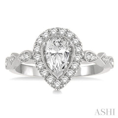 3/4 ctw Carved Shank Round Cut Diamond Engagement Ring With 3/8 ct Pear Cut Center Stone in 14K White Gold