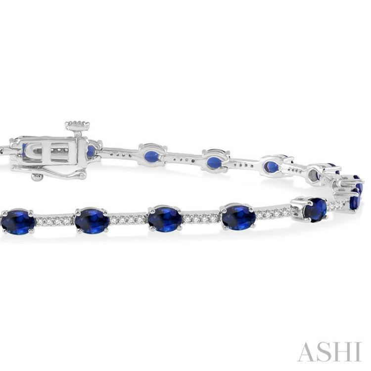 1/3 Ctw Round Cut Diamond & 4x3 MM Oval Cut Sapphire Precious Bracelet in 10K White Gold