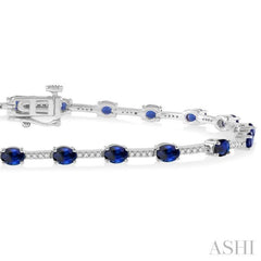 1/3 Ctw Round Cut Diamond & 4x3 MM Oval Cut Sapphire Precious Bracelet in 10K White Gold