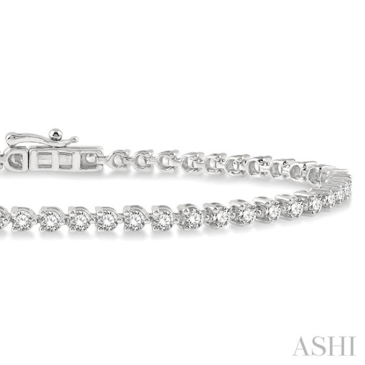 3 Ctw Tri-Prong Round Cut Diamond Tennis Bracelet in 14K White Gold