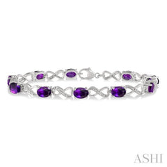 1/10 Ctw Round Cut Diamond & 7x5 MM Oval Cut Amethyst Semi Precious Infinity Bracelet in Sterling Silver