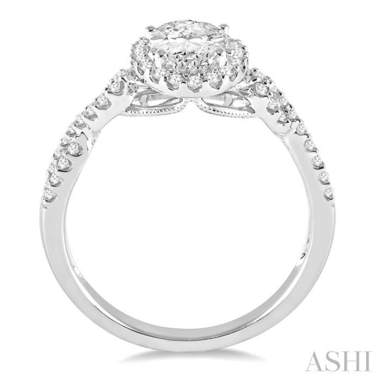 1/4 Ctw Twisted Shank Oval Shape Semi-Mount Round Cut Diamond Engagement Ring in 14K White Gold